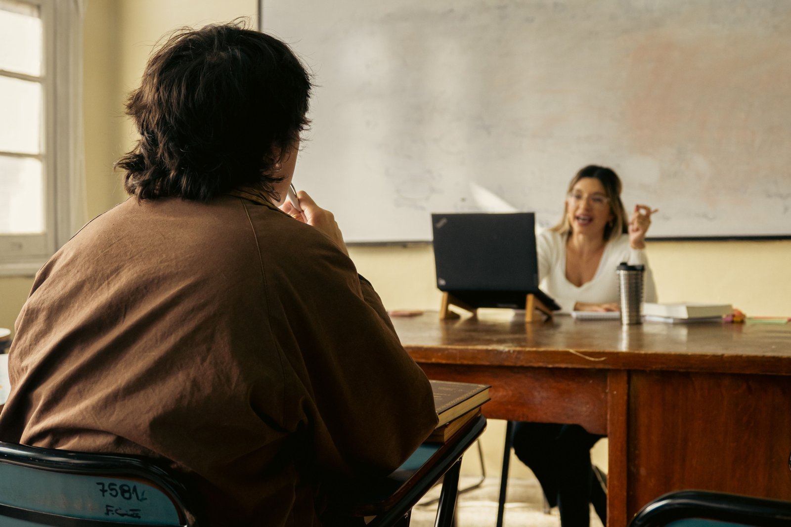 Student attending an online SAT Prep class with an expert tutor